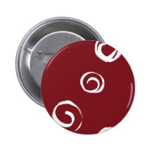White paint swirls on red pins