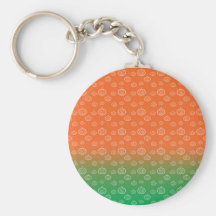 White pumpkin pattern on orange green fade keychains