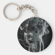 White smoke on black background keychains