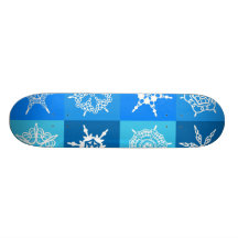 White Snowflakes in Blue Boxes Skate Decks