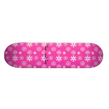 White snowflakes on pink skate board decks
