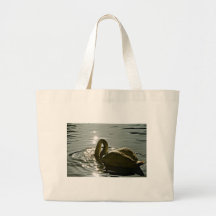WHITE SWAN ON A POND IN THE MORNING LIGHT CANVAS BAGS
