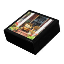 Wicker Chair With Striped Pillow Keepsake Boxes