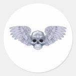 Winged skull round sticker