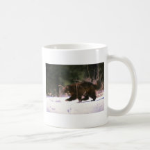 Wolverine running through snow coffee mugs