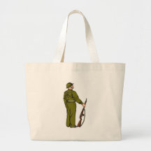 World war two soldier with rifle canvas bags