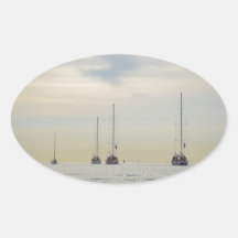 Yachts Heading Out At Dawn Oval Stickers