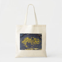 Yellow Lichens on a black rock Canvas Bags