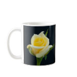 Yellow rose on the black background coffee mug
