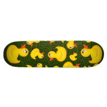 Yellow Rubber Ducks on Green Grass Skateboard