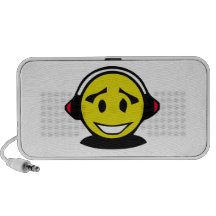 Yellow smiley face wearing headphones travel speakers