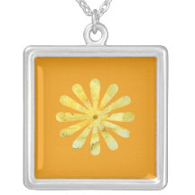 Yellow stained glass flower on orange necklace