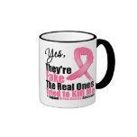 YES They're fake....My real ones tried to kill me Mugs