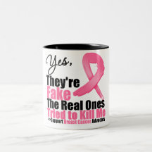 YES They're fake....My real ones tried to kill me Coffee Mug