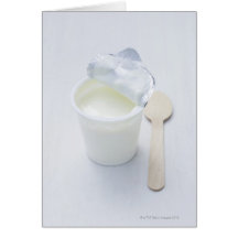 Yoghurt in opened disposable cup card