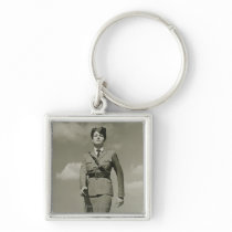 Young woman in military marching on rooftop keychain
