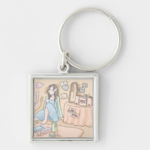 さにさしじ 橙色のお部屋の壁際の隅に座って何かを見ている女性のイラスト KEYCHAIN