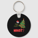 Search for pushing round keychains Santa claus