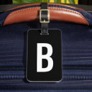 Search for black luggage tags Initial