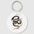 Search for black snake keychains Chinese new year