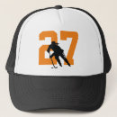 Search for orange and white hats For her