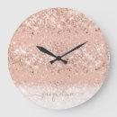 Search for pink and gold clocks Script typography