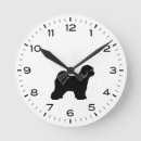 Recherche de tibétain horloges Chien