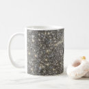Search for the black hole mugs Illuminated