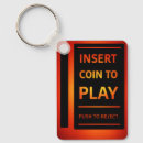 Search for coin keychains Insert coin to play