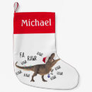 Recherche de dinosaure de noël chaussette de noël Stockage