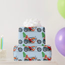 Recherche de père noël sur une moto papier cadeau Vélo