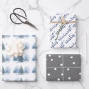 Search for snow covered gift wrap Christmas tree