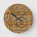 Recherche de guépard horloges Chat