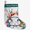 Search for rabbit with a christmas stockings Watercolor