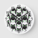 Recherche de chat noir et blanc horloges Chaton