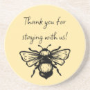 Search for yellow text coasters Bee