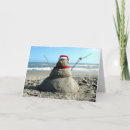 Search for snowman on beach christmas cards Ocean