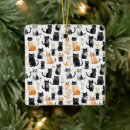Search for orange and white cat ornaments Cats