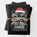 Search for football xmas wrapping paper Santa