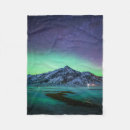 Search for aurora borealis blankets Snow
