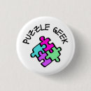Recherche de pièce de jeu badges Geek