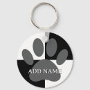 Search for black and white dog keychains Paw