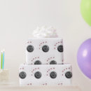 Recherche de broche papier cadeau Motif