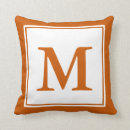 Search for burnt orange white pillows Initial