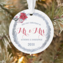 Search for poinsettia ornaments Newlyweds