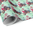 Search for motorcycle christmas wrapping paper Claus