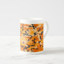 Recherche de camouflages tasses Pour elle