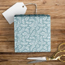 Recherche de feuille papier cadeau Vacances
