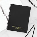 Search for black with gold notebooks For him