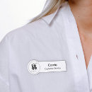 Search for black and white name tags With magnetic back